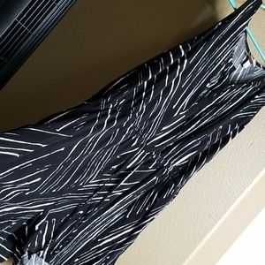 Strip romper with belt to show off waist